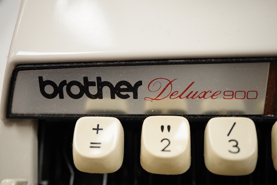 A 1970’s Brother Deluxe 900 working portable typewriter, 30cm x 30cm